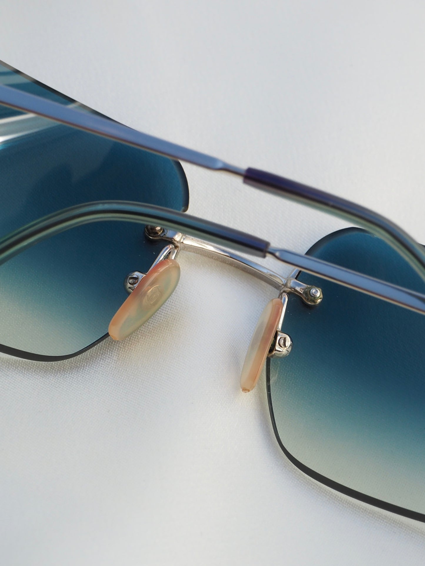 CHANEL 4017-D CRYSTAL CC LOGO RIMLESS SUNGLASSES TURQUOISE