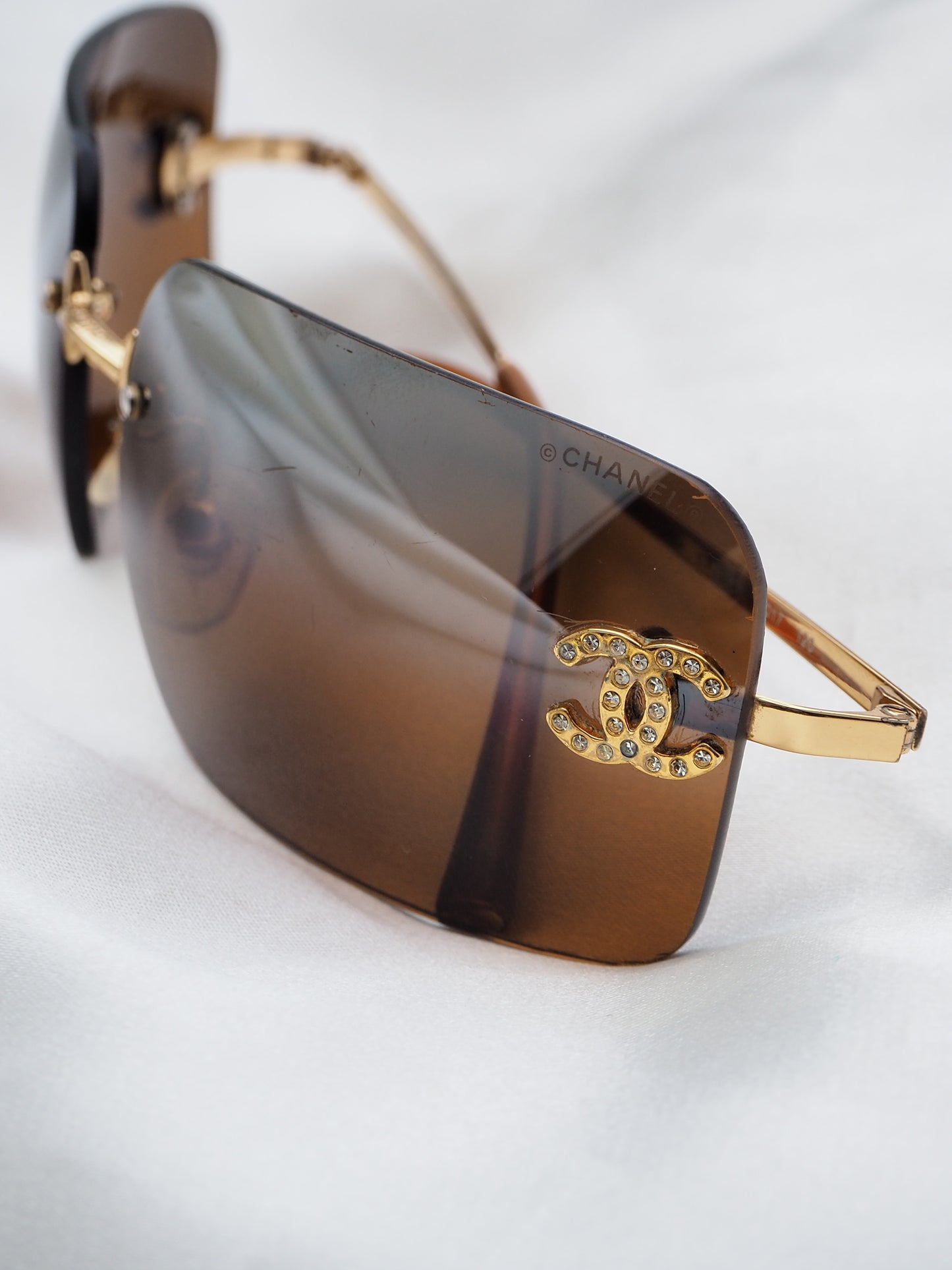 CHANEL 4017-D CRYSTAL CC LOGO RIMLESS SUNGLASSES BROWN