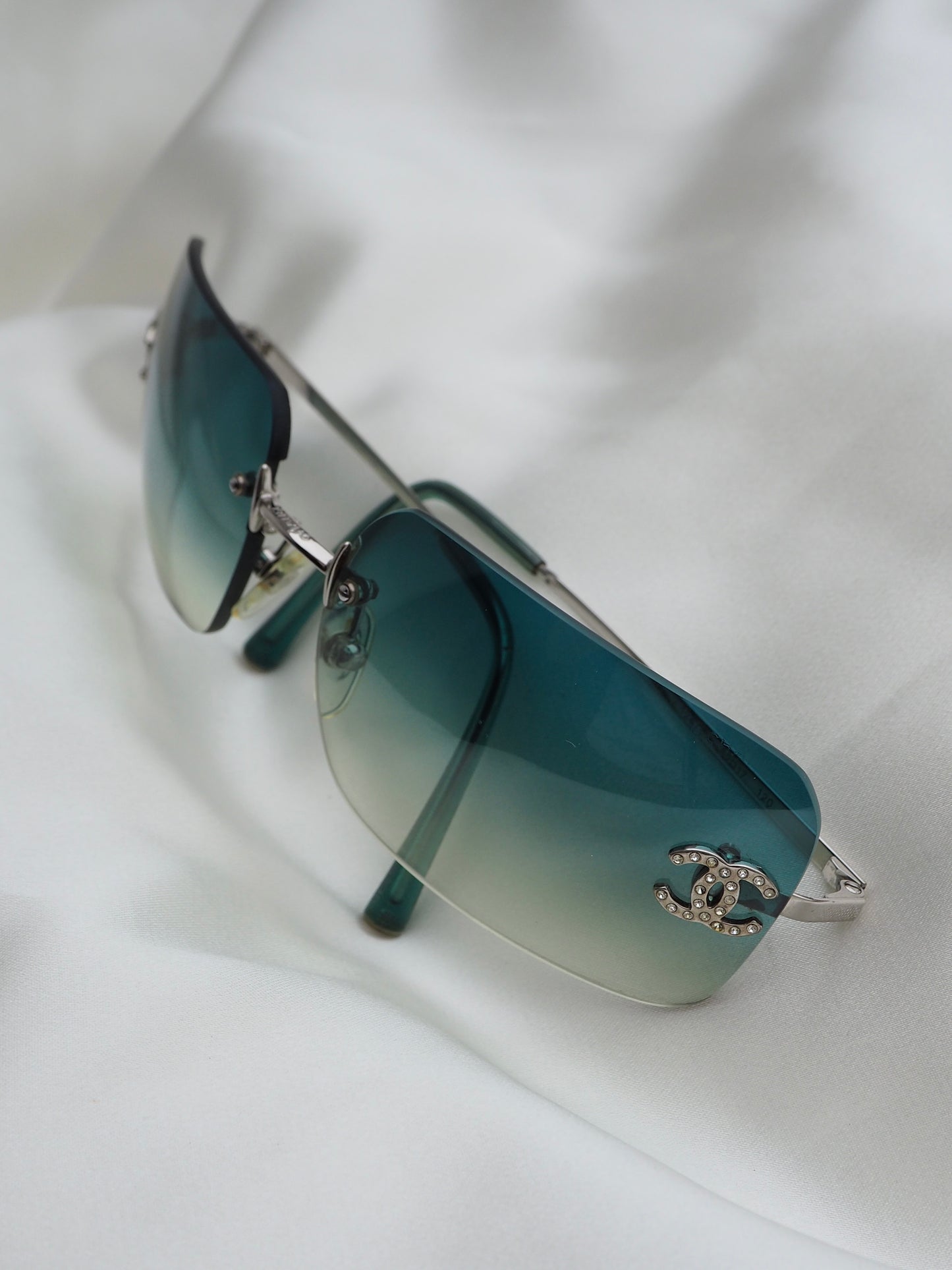 CHANEL 4017-D CRYSTAL CC LOGO RIMLESS SUNGLASSES TURQUOISE