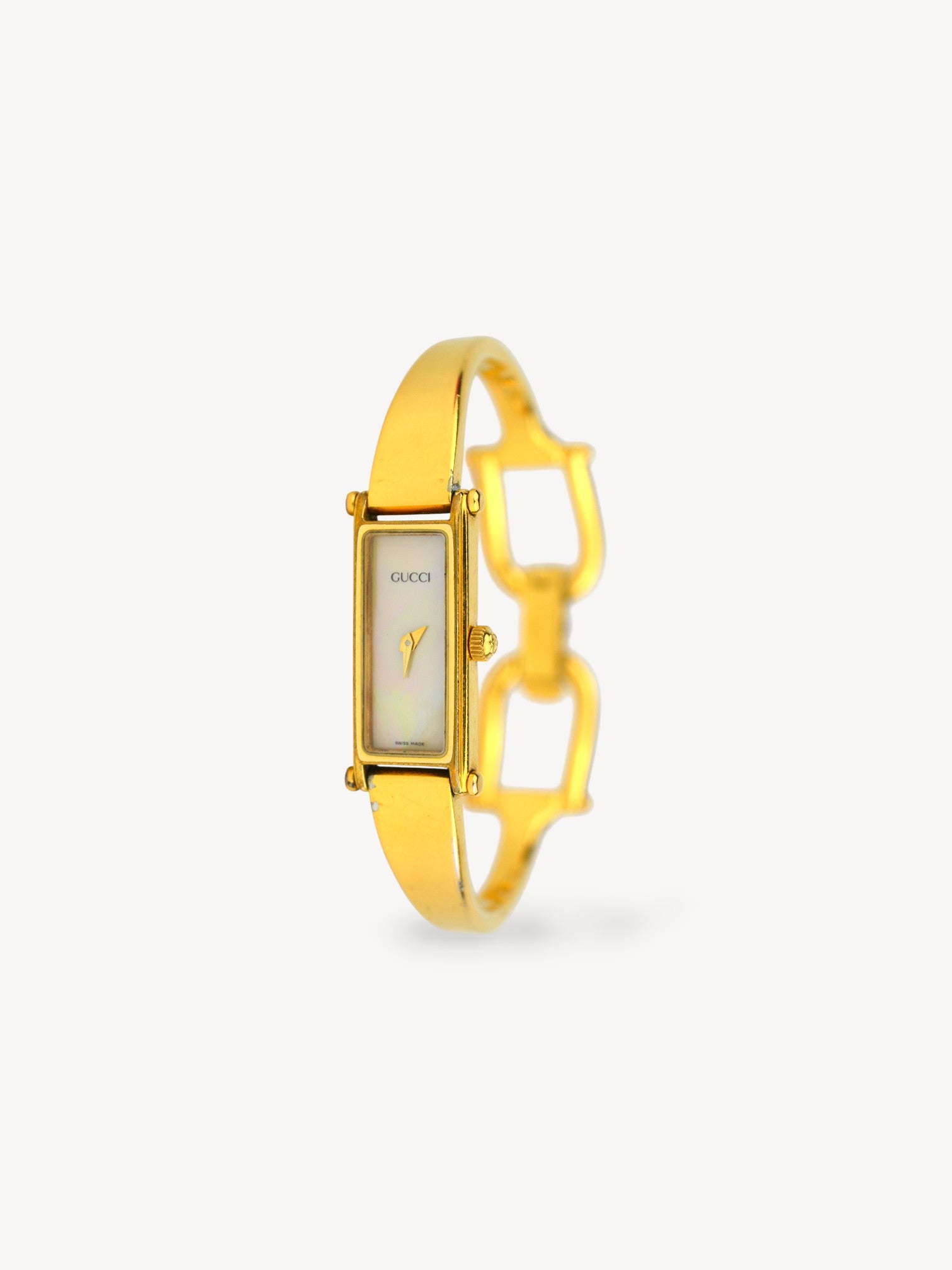 589 GUCCI レディース 1500 バングル ゴールド バングル 1990s Gucci 1500L Gold-Plated Horsebit Watch with Mother of Pearl