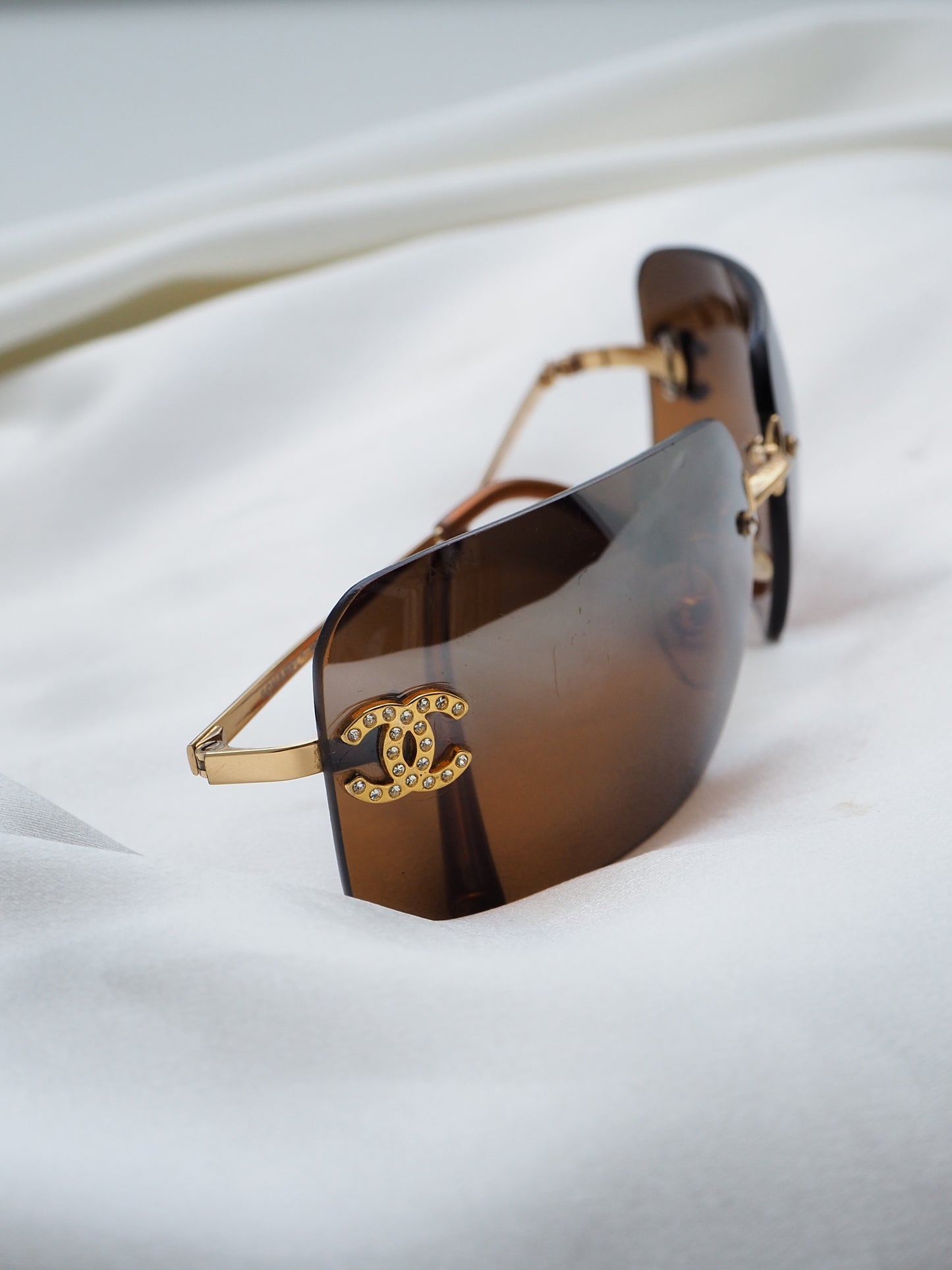 CHANEL 4017-D CRYSTAL CC LOGO RIMLESS SUNGLASSES BROWN