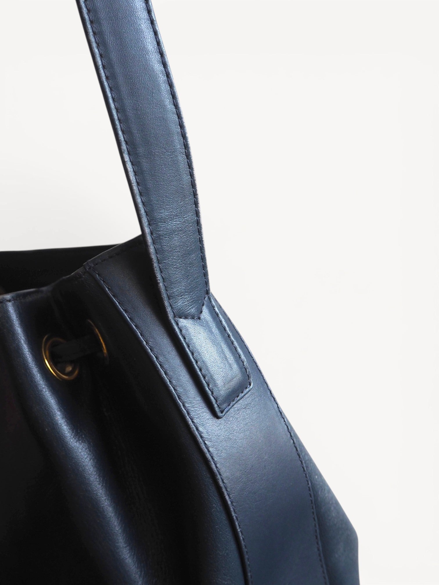 1980s Christian Dior Bucket Bag in Navy Leather with Logo Charms