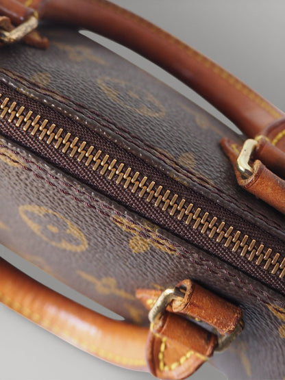 LOUIS VUITTON MINI SPEEDY